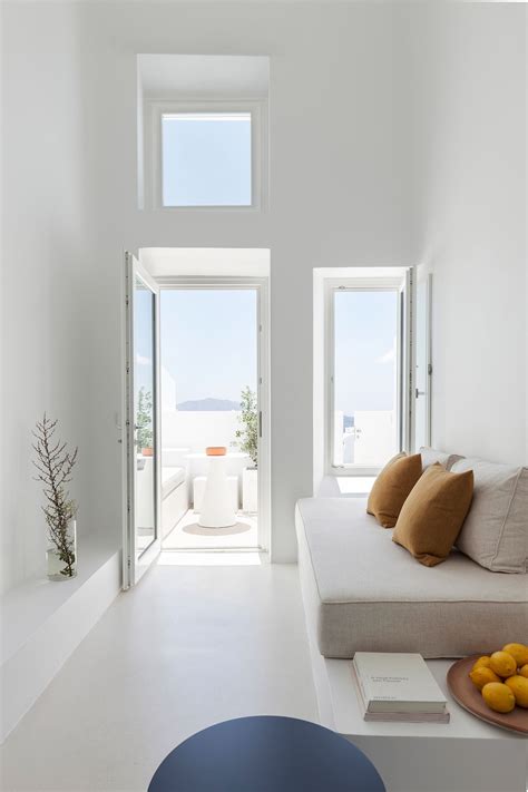 Kapsimalis Architects Refurbishes Santorini Cave House Home White