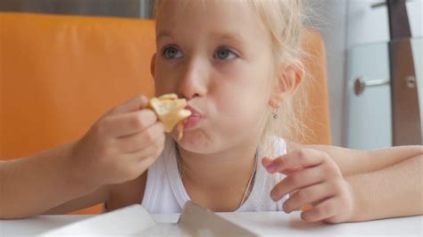 Child Enjoying Pizza In Restaurant Last Stock Footage Sbv 325561123