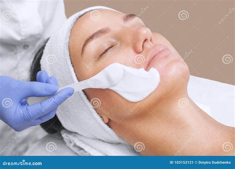 The Cosmetologist For Procedure Of Cleansing And Moisturizing The Skin