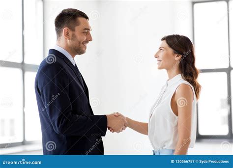 Businesswoman And Businessman Shake Hands Stock Image Image Of Deal
