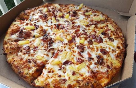 dominos adds   topping handmade pan pizza  weeklong carryout deal