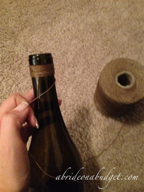 A Bride On A Budget Diy Twine Wrapped Wine Bottle Centerpieces Tutorial