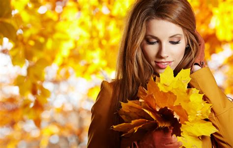 Bigstock Young Woman With Autumn Leaves 25084727 Jill Zander