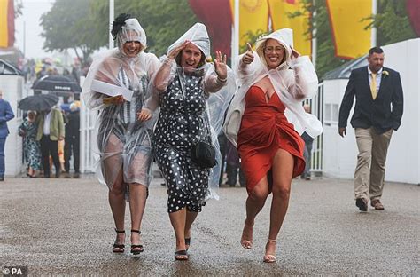 Refusing To Rein It In Stylish Goodwood Revellers Brave The Wet