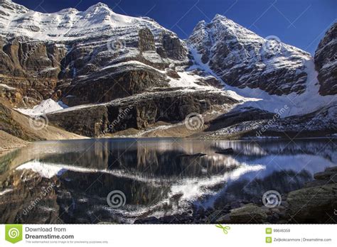 Lake Oesa And Snowy Mountain Tops In Yoho National Park Stock Image