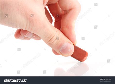 Hand Holding Eraser Isolated On White Stock Photo Edit Now 70325878