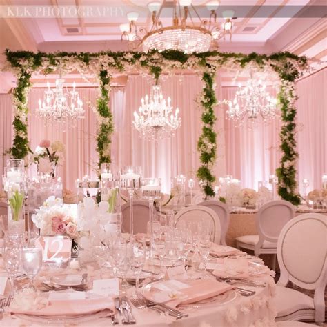 all pink wedding reception greenery green garlands white and light pink room crystal ch
