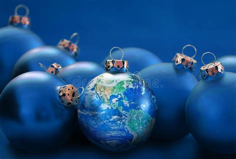 Earth Globe As Christmas Ball Between Blue Baubles Metaphor Uni Stock