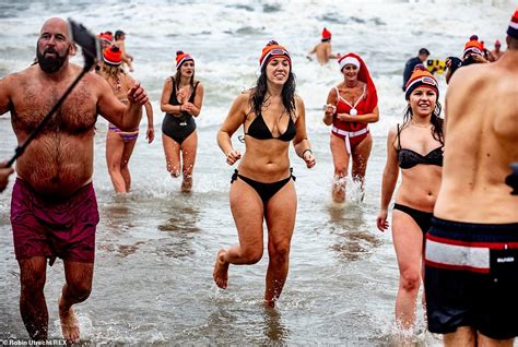 People All Over The World Participate In Polar Bear Plunges Across The