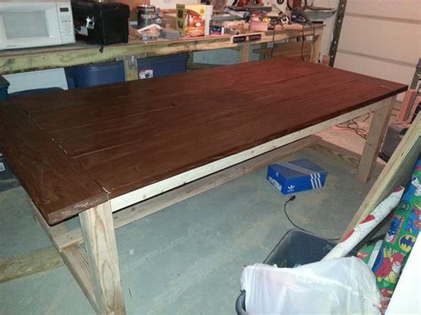 Farmhouse dining tables typically feature natural wood or distressed paint finishes. Ana White | Farmhouse table with epoxy finish - DIY Projects