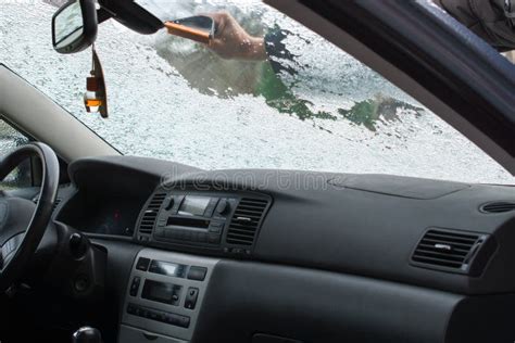 Man Scraping Ice From The Windshield Of A Car Stock Photo Image Of