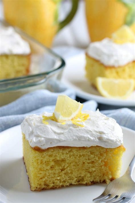 This Lemonade Cake With Whipped Lemon Frosting Is An Easy Classic Poke Cake Recipe That Is The