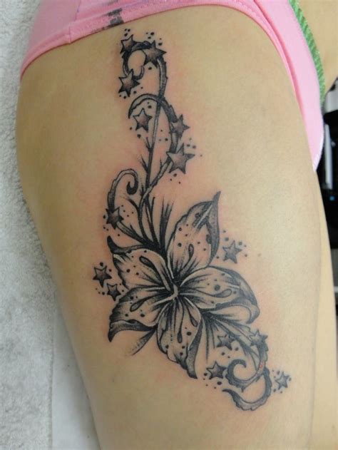 23 Flower Tattoo Around Thigh