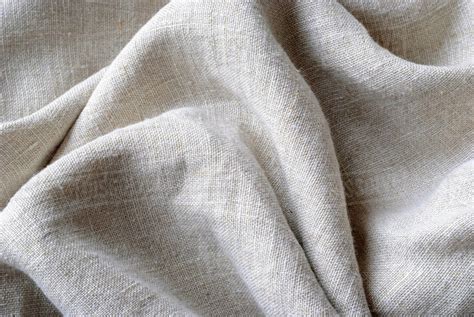 Gathered And Folded Texture Of Woven Linen Fabric With Natural Fibres