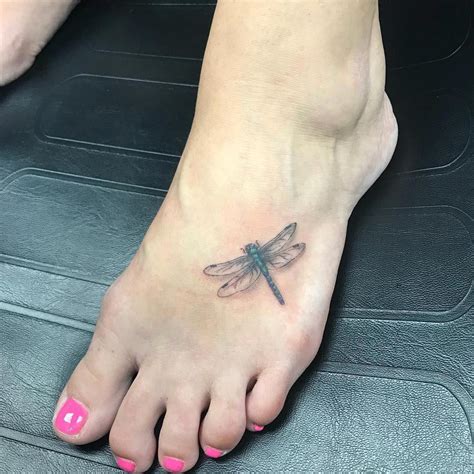 Dragonfly tattoo comes to the second place when we talk about getting an insect tattooed. womens foot tattoos #Foottattoos in 2020 | Dragonfly ...