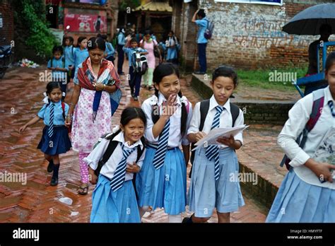 Nepali Students Return Home After A Day At School Stock Photo Alamy