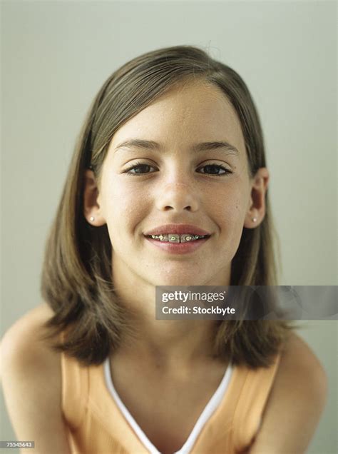 Girl With Bracesmilingportraitcloseup High Res Stock Photo Getty Images