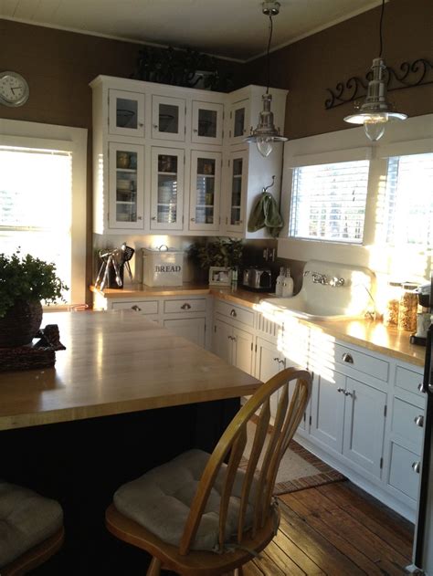 Farmhouse kitchens with white cabinets. farmhouse kitchen - darker colors | House Beautiful ...