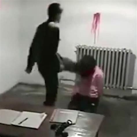 Horrifying Footage Shows Brutal North Korean Agents Beating A Woman As