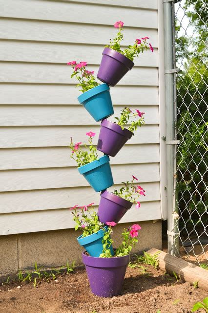 How To Make A Vertical Clay Pot Garden Vertical Garden Ideas Hanging