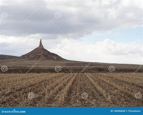 Nebraska`s Chimney Rock With Field In Foreground Stock Photo Image Of