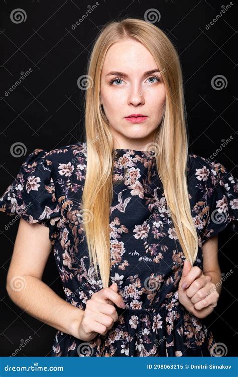 portrait of a beautiful slender blonde woman in a dark summer dress stock image image of