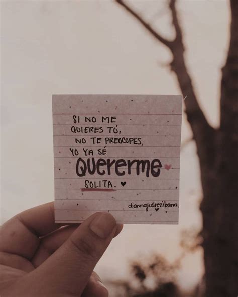 Someone Holding Up A Piece Of Paper With The Words Querema Written On It