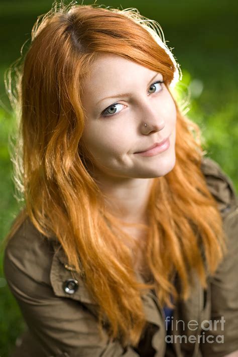 Romantic Closeup Portrait Of A Young Redhead Girl Sitting In The