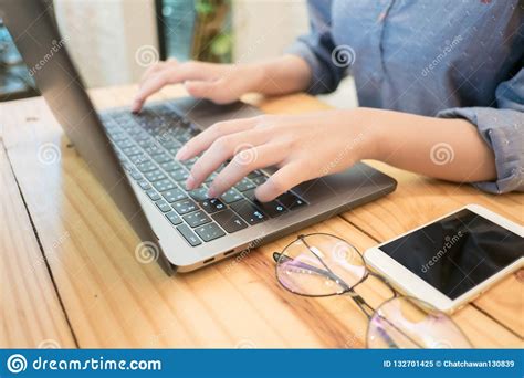 Young Woman Hands Typing Laptop Computer In Cafe Working Woman Stock