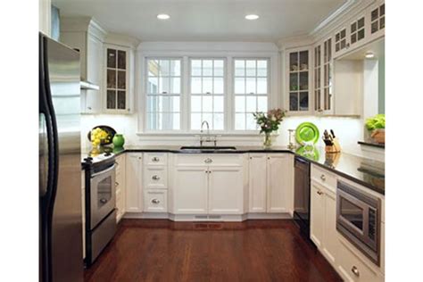 This type of layout is great for efficiency, as it creates a seamless work triangle if your appliances and work areas are. Kitchen Layouts, Galley Kitchen Layout, Horseshoe Kitchen ...