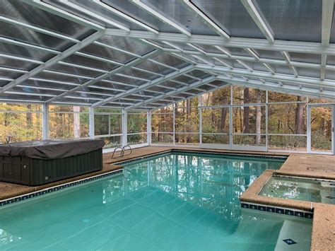 Residential Pool Enclosure System Manufactured By Roll A Cover Intl