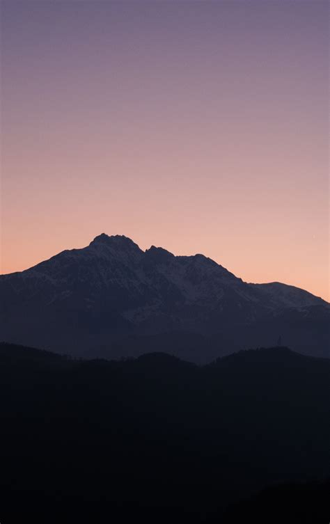 Download 840x1336 Wallpaper Mountains Sunset Clean Skyline Mist