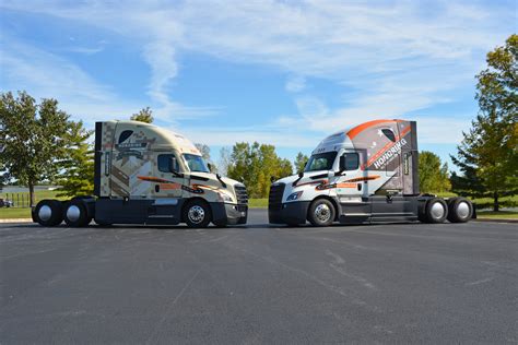 Military-wrapped trucks honor Schneider veterans