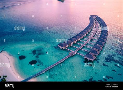 Drone Photo Wooden Water Villas Seen From Above And An Amazing Blue