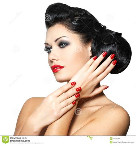 Fashion Woman With Red Lips Nails And Creative Hairstyle