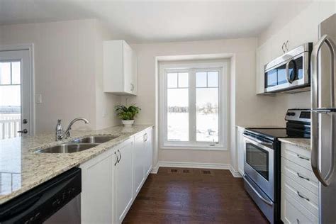 Check spelling or type a new query. Mattamy kitchen - white cabinets, light granite (my guess ...