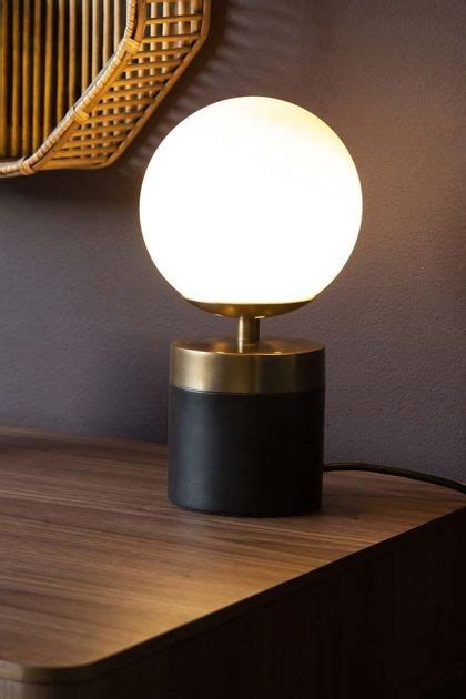 About 5% of these are chandeliers & pendant lights, 24% are table lamps & reading lamps, and 10% are led wall lamps. White Glass Globe Table Lamp With Black & Brass Base ...