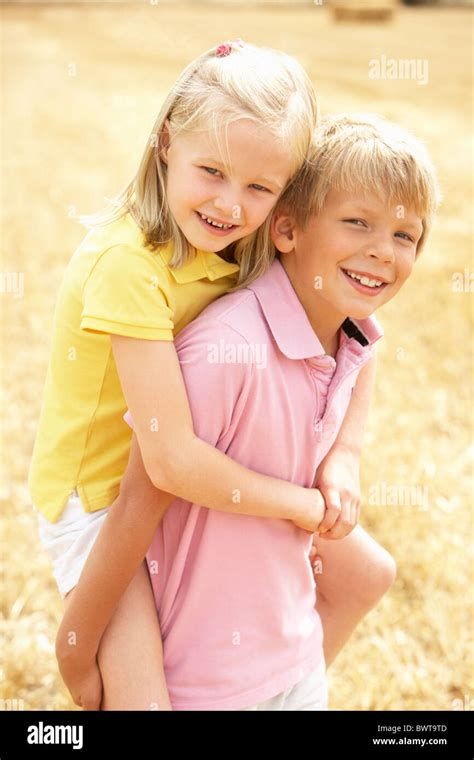 Boy Hay Bale Smiling Girl Hi Res Stock Photography And Images Alamy