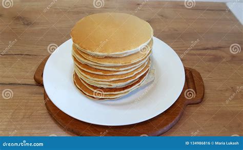 Pancakes On The White Plate Many Pancakes Are Stacked Stock Photo