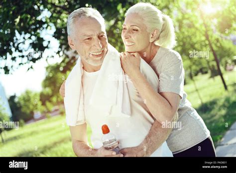 Emotional Senior Woman Hugging Her Husband Stock Photo Alamy