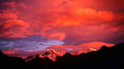 Clouds And Sunset Over Mountains Hd Wallpaper Background Image