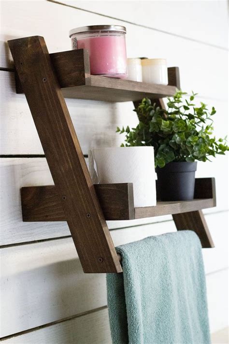 Shelf design bathroom storage shelves diy towels rustic bathroom shelves bathroom wood shelves wood bathroom brushed nickel towel bar diy towel rack bathroom shelves. Floating Ladder Shelf with Towel Bar in 2020 | Hanging ...