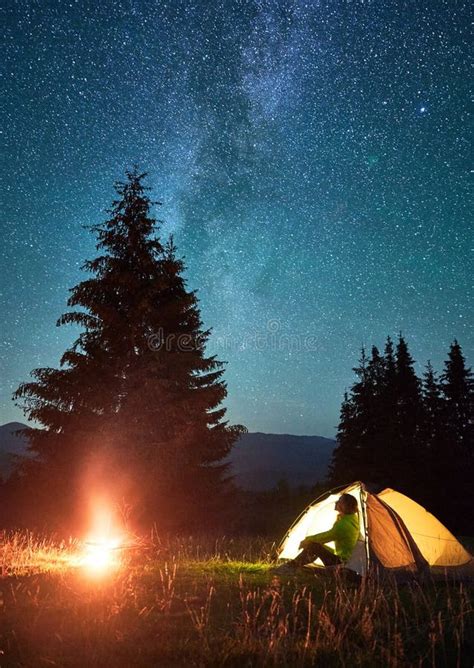 Night Camping In Mountains Under Starry Sky With Milky Way Stock Photo