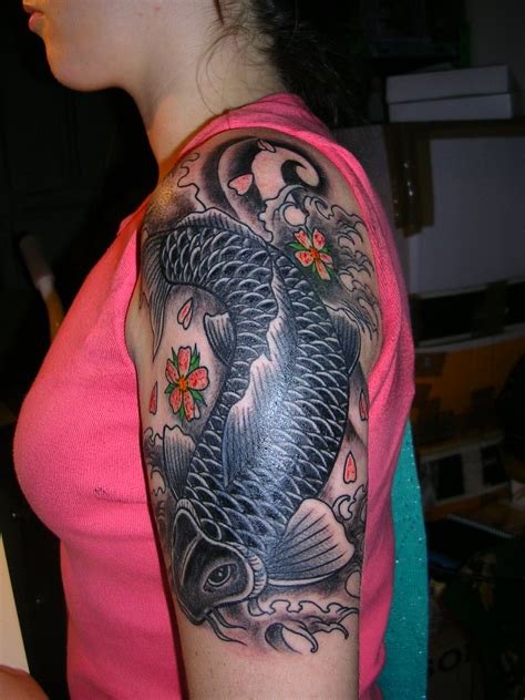 Flowers symbolize innocence and romantic personality. girl tattoo designs dragon: Koi Tattoo Designs For Women