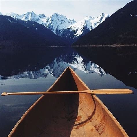 Canoe Below The Mountains Pictures Photos And Images For Facebook