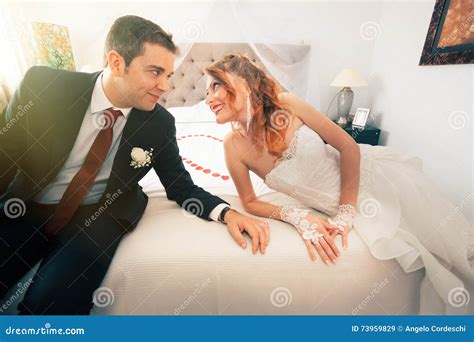 Newlyweds In Bedroom Loving Stock Image Image Of Flower Dress 73959829