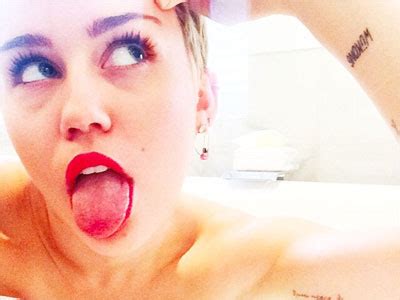 Miley Cyrus Tattoos Meanings Steal Her Style Xxxpicss