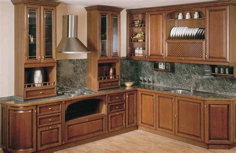 Diagonal cabinets are a common solution to the kitchen corner problem. Corner kitchen cabinet designs. | An Interior Design
