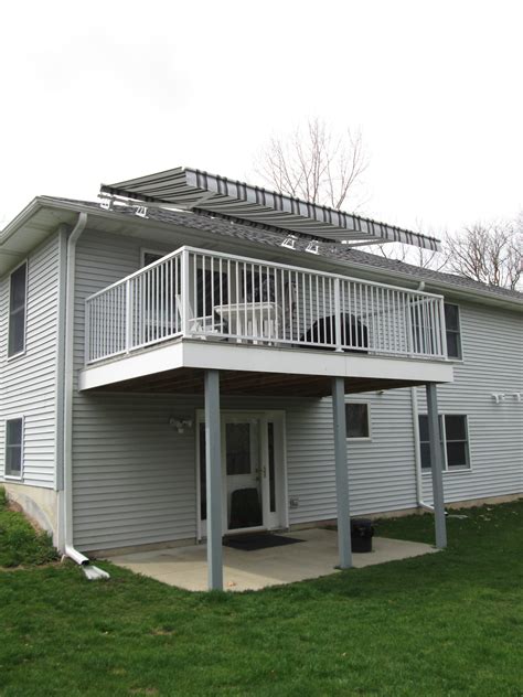 Home Retractable Deck Awnings 10 Muskegon Awning And Fabrication