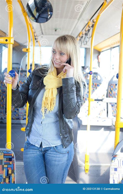 Blond Woman With A Smart Phone Inside A Bus Stock Photo Image Of
